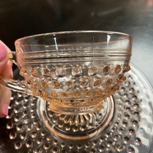 Pink depression glass teacup and saucer